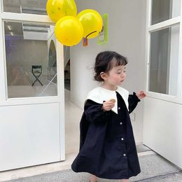 Robes de fille Fille robe en coton nouveau à manches longues enfant en bas âge bébé sigle boutonnage arc robes noires et blanches pour jeunes enfants vêtements pour enfants