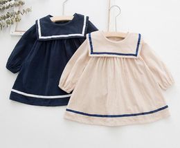 Robes de fille Ins Baby Girl Vêtements Robe printemps Frintemps Kids Simple Army Style Long Manche Big Turn Down Collar Elegant Princess