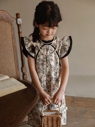 Vestidos de niña Rok Qipao Lengan Terbang Anak Perempuan 2023 Kancing Cetak Gaya Cina Baru Baju Bayi Selutut 4 12y 230510