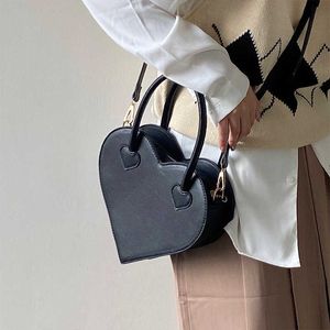 Sac d'amour de Niche pour fille, sac à main à la mode et minimaliste pour femme, sac croisé noir à bandoulière diagonale simple, tendance 240315