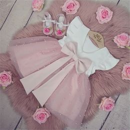 Robes de filles 05Y Summer Princess Infant Baby Girls Dress Ruffles Sleeve Solid Pearl Lace Patchwork Back Bowknot Tutu Dress 230210