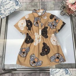 Vestidos para niñas 23SS Diseñador de marca Vestido para niños Moda Solapa Manga corta Vestidos de cintura Osito de peluche Imprimir Falda clásica Ropa de bebé A1 Dr DH3LX