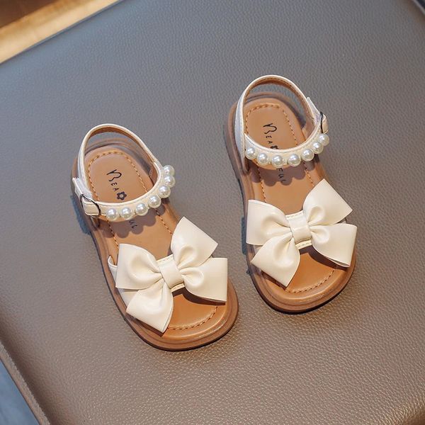 Filles sandales enfants mode plat PU Bow perles polyvalent chaussures décontractées respirant doux doux princesse enfants chaussures coréen 240311