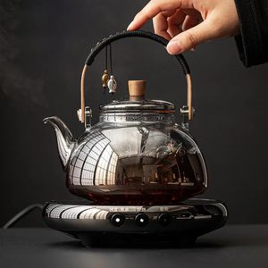 Théière en verre Bouilloire à faisceau Poêle à poterie électrique domestique Ensemble de théière Cuisson et cuisson à la vapeur Bouilloire à thé à double usage Infuseur à thé 231225