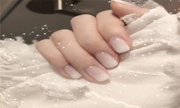 Ongles français ombre blancs brillant Appuyez sur un ensemble de ongles à couverture complète courte
