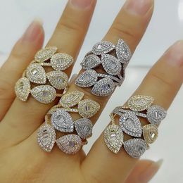 Godki Luxury Leaves Cluster Design anillos de declaración audaces con piedras de circonía Joyería de participación de mujeres Alta calidad 240521