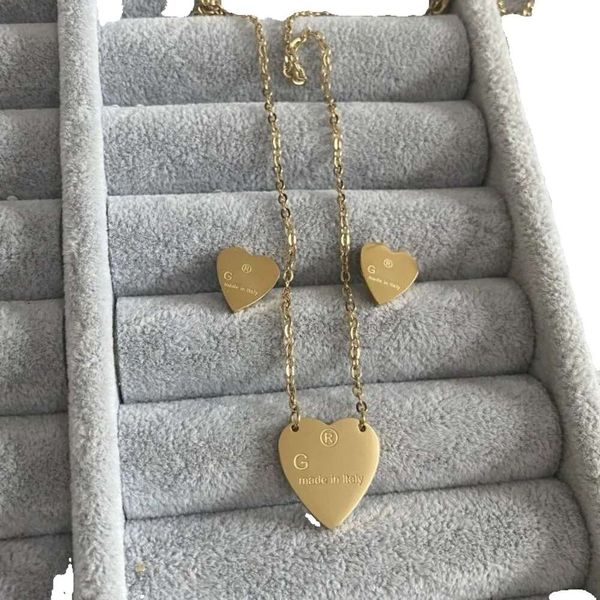 Color dorado marca corazón collares pendientes pendientes letra G collar de amor simple mujeres conjuntos de diseñador al por mayor