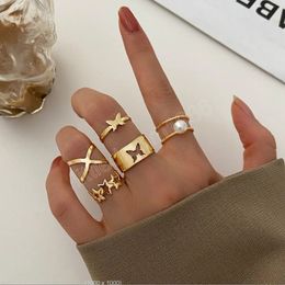 Conjunto de anillos huecos de mariposa de Color dorado, anillos abiertos de estrella de perlas de imitación a la moda para mujer, regalo de joyería Vintage para mujer