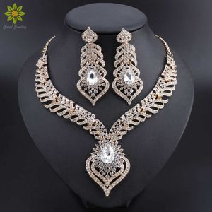 Couleur or complet strass clair déclaration collier boucles d'oreilles ensemble pour les femmes indiennes bijoux de mariage de mariée ensembles H1022