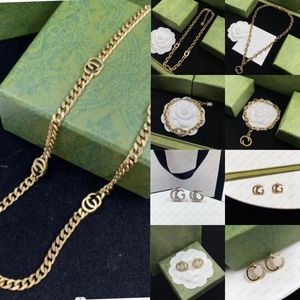 Gouden ontwerper hangers ketting mannen ketting vrouwen armband en oorbellen g sieraden mode ketting cadeau met doos