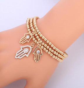 Gold Evil Eye Bracelet Turkish CZ Crystal Small Charm Hand of Hamsa armbanden voor vrouwen Elastische keten Fashion bead sieraden geschenken 5237619