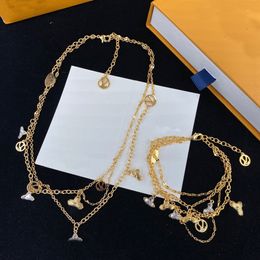 Collier pendentif trèfle à quatre feuilles en or, étoile de trèfle à quatre feuilles pour fête de mariage, bijoux en acier inoxydable