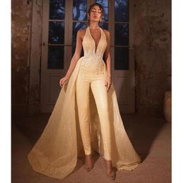 Robes de combinaison dorées avec jupe détachable licou dentelle appliquée robes de soirée sans manches balayage train grande taille sexy bal de promo W6714896