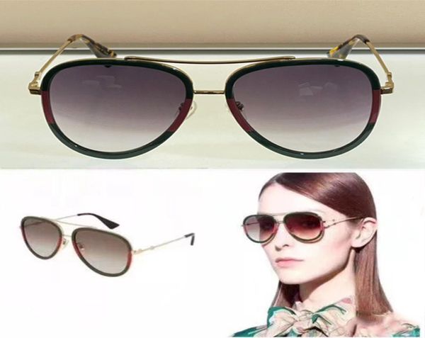 Gafas de sol de metal dorado 0062 con anteojos con montura web verde y roja Código histórico de la casa Detalle de marca Gafas de diseño de abejorro A6205649