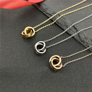 Collier de créateur de chaîne plaqué or pour les femmes Chaînes à pendentif Bijoux en acier inoxydable à la mode dorée Colliers de chaîne de créateur minimalistes Chaîne de pendentif de luxe