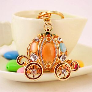 Vergulde sleutelhanger legering prinses pompoen vervoer hanger auto sleutelhangers ornament sieraden handtas decor sleutelring ringen 3 stks