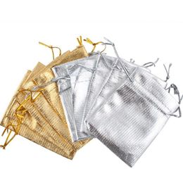 Gold Silver Drawstring Bags Bolsas Organizador de joyas Bouch Satin Boda de Navidad Favor Packaging 7x9cm 100pcs Lot312p