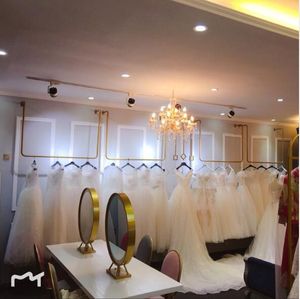 Perchero de pared dorado para vestido de novia, muebles comerciales, colgadores de ropa para hombres y mujeres, perchero en forma de U para tienda de tela en el techo