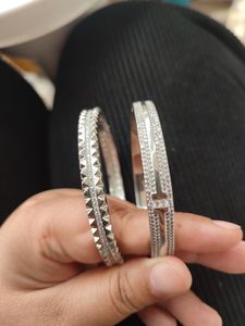bracelets jonc pour femmes en or bracelets de créateurs de roue dentée bijoux pour hommes bijoux en argent de haute qualité unisexe mode diamant fête cadeaux de mariage vacances anniversaire