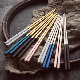 Gouden chopstick roestvrij staal wo met zwart wit roze blauw uiteinde