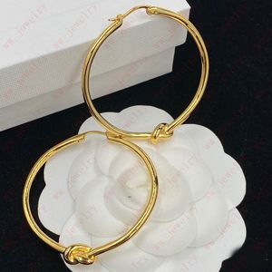 Cercle minimaliste doré de plaine Attachez une boucle d'oreille de cercle de noeud Hoop Huggie, sentiment avancé de cravate de corde, ornements de dame de styliste, Noël, cadeau de Thanksgiving de Pâques