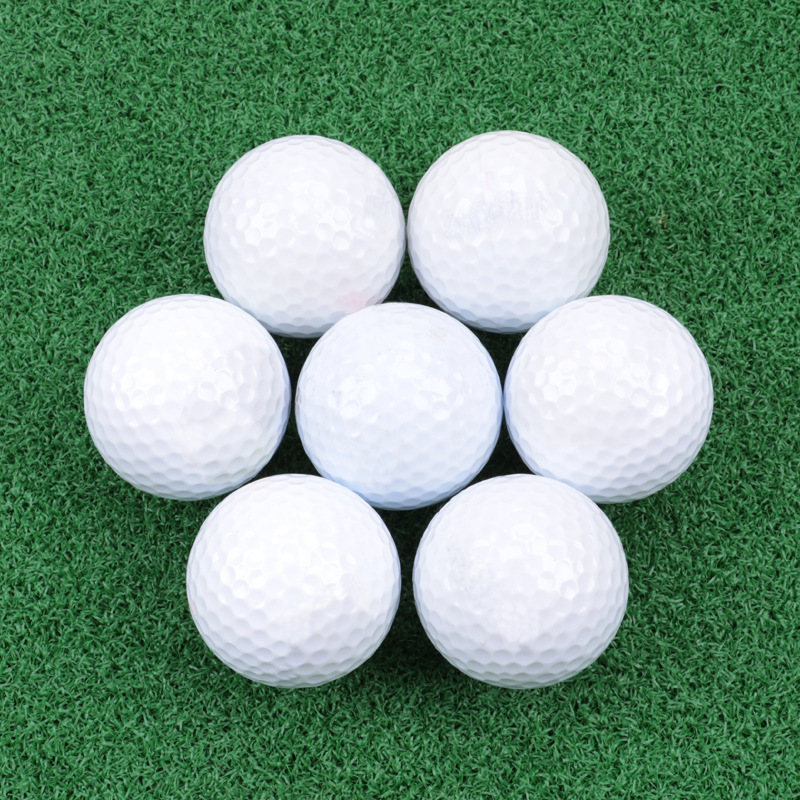 Pelotas de golf Pelotas de juego de práctica de golf de alta calidad 50 PCS Nivel de partido profesional 3 capas con marca Cesta de almacenamiento de metal Pelota de entrenamiento de swing de club de goma resistente