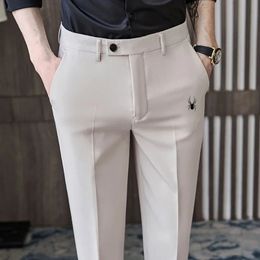 Pantalon de golf Men Slimfit Drape Casual Suit coréen version élastique Skinny Sports neuvième Pant 240402