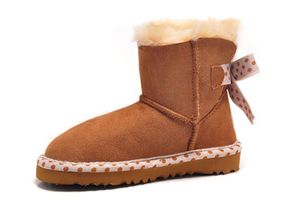 Bon marché enfants bottes de neige dos papillon tricot cheville bottes de neige légère semelle en caoutchouc portable 100% laine rembourré super chaud Eu27-35