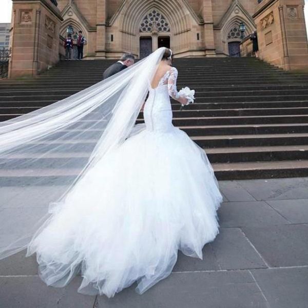Magnifique robe de mariée sirène arabe col en V trompette dentelle appliques tulle gonflé dos ouvert robes de mariée avec manches illusion sur mesure