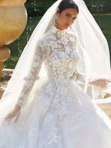 Magnifique robe de mariée à col haut avec des appliques en dentelle florale à manches longues et une ligne de train de chapelle robes de mariée en tulle blanc sur mesure 2024