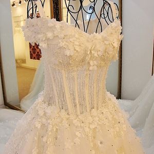 Magnifique robe de mariée en dentelle, corset, épaules dénudées, lacets dans le dos, traîne sexy transparente avec broderie et perles appliquées