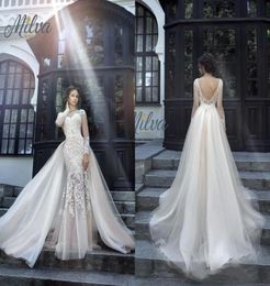 Magnifiques robes de mariée Milva Illusion manches longues dos bas en dentelle robe de mariée sirène avec jupe détachable 2389646