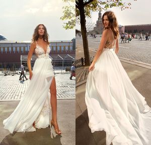 Prachtige open rug spaghetti een lijn trouwjurken mode chiffon sexy hoge split bridal jurken illusion tiered beach jurk