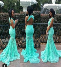 Robes de bal sirène en dentelle turquoise gracieuse 2016 V couches de cou de cou boss sans dos voir à travers le train en dentelle Robes de fête formelle2464641