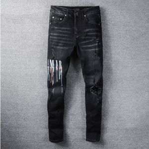 Grafische jeans herenbroeken Mode High Street Zwart Veelkleurig Letterprint Elastische motorbroek Hiphop