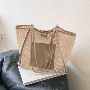 Sac tissé d'herbe, sac pour femmes, sac de plage à la mode, 2023 Nouveau sac tissé à haute capacité, Sac à bandoulière simple et décontracté 240402