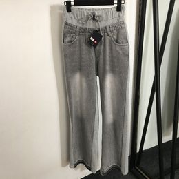 Grijze designer jeans vrouwelijke luxe jeans broek elastische taille lange broek streetstyle persoonlijkheid rompers jean pant