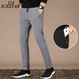 Grijze sport broek mannen ademende sneldrogende casual rits pocket sweatpants zomer merk fashion losse 's 210715