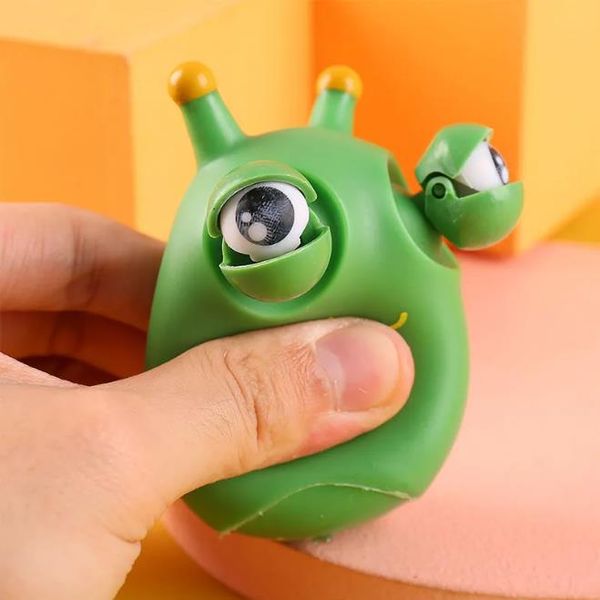 Les chenilles aux yeux verts éclatent et serrent les jouets anti-stress pour enfants adultes