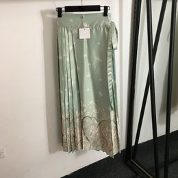 Jupes plissées vertes design jupes de visage de cheval luxe jupe douce tactile chinois filles robes de plage jupe décontractée