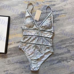 Maillot de bain une pièce avec logo en métal gris et vert