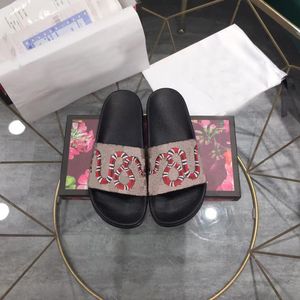 Diseñador Diapositivas de lujo Zapatillas para mujer Impresión de flores correctas Damas de cuero Chanclas Negro Blanco Rojo con caja OG Bolsa para el polvo Moda Hombres Zapatos Sandalias