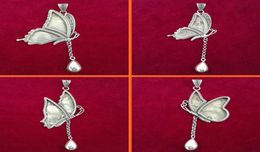 Guizhou estilo étnico hecho a mano Miao plata DIY collar colgante inferior vacío soporte viejo bordado accesorios mariposa campana Inla5244170