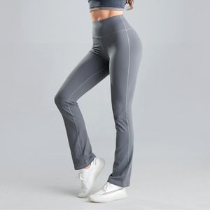 Tenues de yoga Leggings de gymnastique Pantalons Femmes Fitness Course Loisirs Lâche et confortable Pantalon évasé de couleur unie