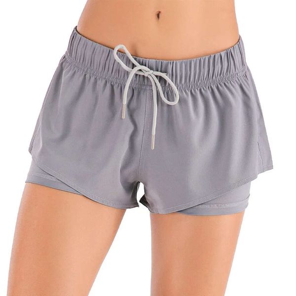 Les shorts de gym alignent Lu Femmes Pocket Dry Jogging Running Sports Yoga Training Summer Pants Fiess Lemon Gym Running Workout