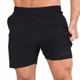 Gymohyeah 2021 Nuevo Venta caliente Fi Casual Verano Hombres Jogger Pantalones cortos Pantalones cortos de secado rápido Masculino Pantalones cortos de alta calidad 18ja #