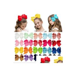 Accessoires de cheveux 40 couleurs 6 pouces Boutique Ruban solide Grosgrain Bow avec clips pour enfants filles à la main Drop Livraison bébé maternité DHSQ1