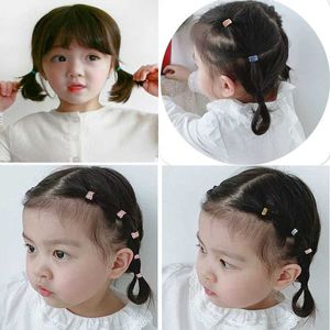 Accessoires de cheveux 50/100 PCS / BOX NOUVEAUX ENFANTS COULEURES COLLES SOLMES ÉLASTIQUES CHILRES BÉBRES GRILLES BLAQUES SCRUNCHIES JANDES RAFFESS