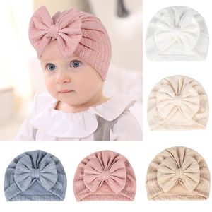 Haaraccessoires Baby hoed schattige bogen meisje tulband hoeden vaste kleur zacht katoenen elastische bowknot geboren peuter motorkap beanhair