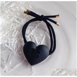 Accessoires pour cheveux Designer Corde Sweet Black Love Scrunchie Rubber Band Logo Élastique de haute qualité Marque Ponytail Holder Luxe Drop Deli Otttx